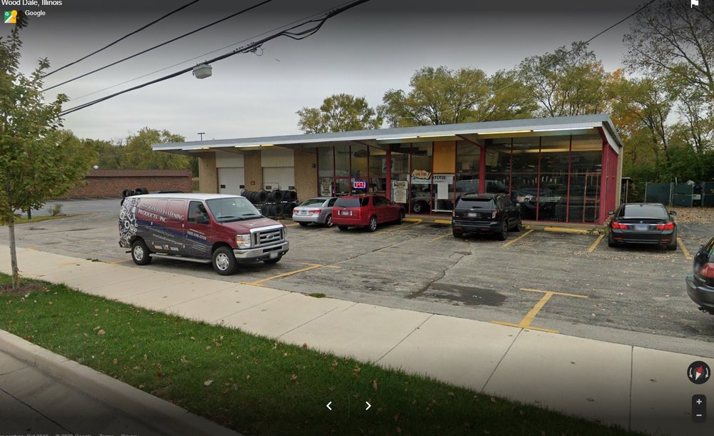 Auto ProCare shop exterior with service bays and customer vehicles